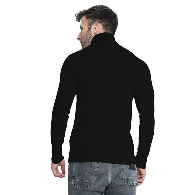 Man showing the back view of black high-neck full-sleeve t-shirt paired with jeans.